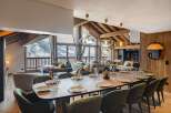 Experience luxury living in this stunning property, featuring a spacious dining area perfect for entertaining.