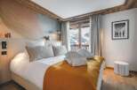 Experience luxury and comfort in this stunning bedroom.