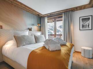Experience luxury and comfort in this stunning bedroom.