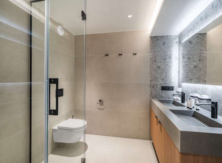Step into a modern oasis with this stunning bathroom design.