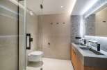 Step into a modern oasis with this stunning bathroom design.