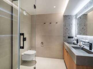Step into a modern oasis with this stunning bathroom design.