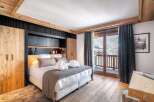 Experience luxury and comfort in this stunning bedroom.