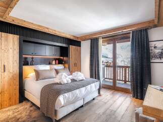 Experience luxury and comfort in this stunning bedroom.