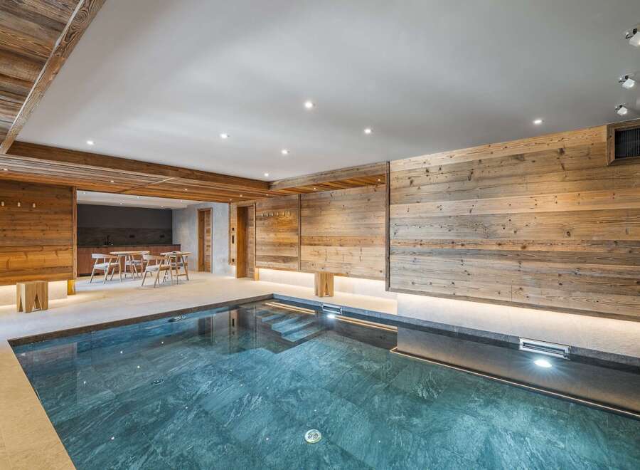 Experience luxury living in this stunning property featuring a private indoor pool.