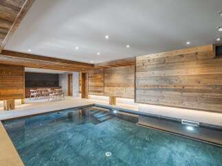 Experience luxury living in this stunning property featuring a private indoor pool.