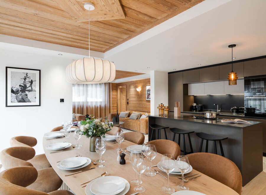 Experience luxury living in this stunning property, featuring a spacious dining area perfect for entertaining.