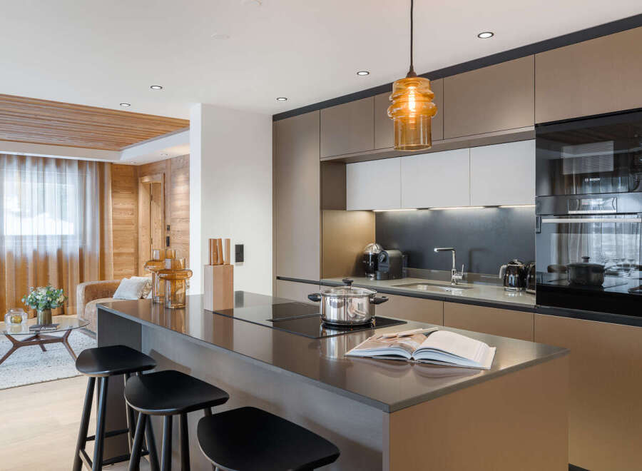 This stunning kitchen boasts modern design and high-end appliances, perfect for culinary enthusiasts.