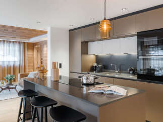 This stunning kitchen boasts modern design and high-end appliances, perfect for culinary enthusiasts.