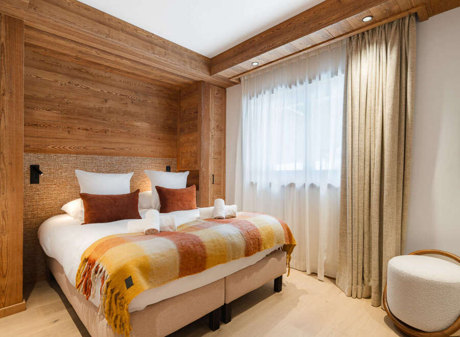 Experience the warmth and charm of this beautifully designed bedroom.