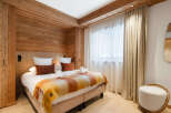 Experience the warmth and charm of this beautifully designed bedroom.