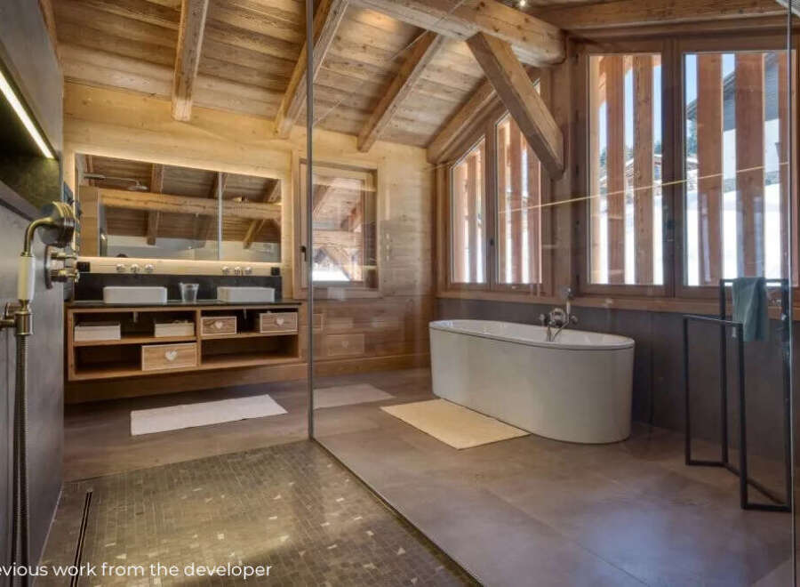 Experience rustic luxury in this stunning bathroom.