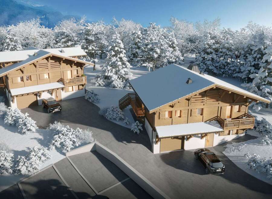 Experience the ultimate winter getaway in these stunning wooden chalets nestled in a snowy landscape.