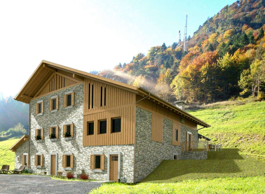 Discover the charm of this stunning stone house nestled in a picturesque mountain setting.