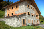 Discover the charm of this stunning stone house, a perfect blend of rustic elegance and modern comfort.