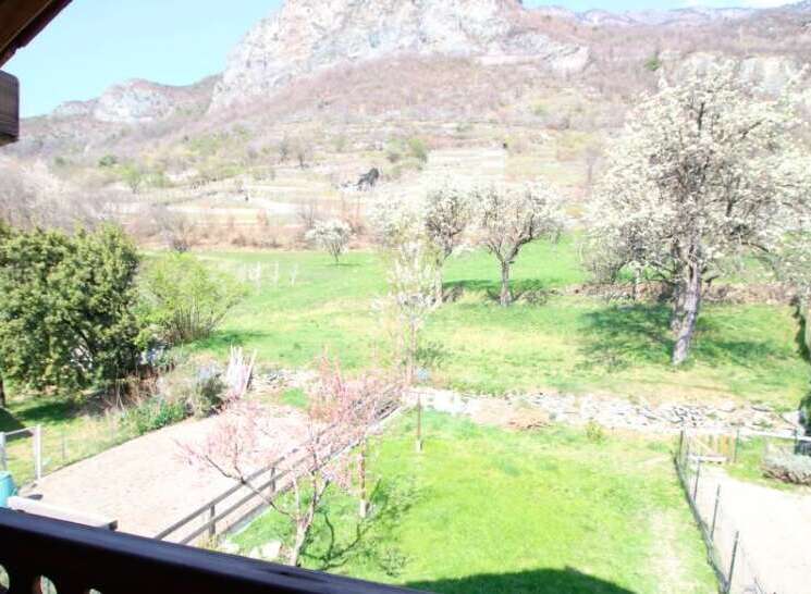 Enjoy breathtaking mountain views from this charming property.