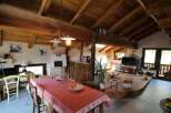 This charming property boasts a rustic interior with exposed wooden beams and a cozy atmosphere.