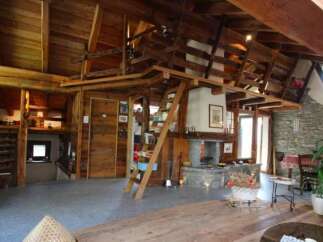 Step into a rustic haven with this stunning wooden interior.