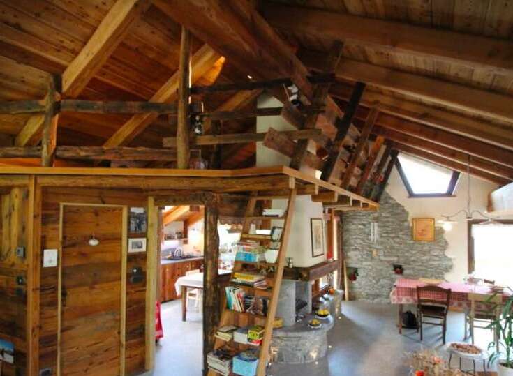 Experience rustic charm in this stunning wooden home.