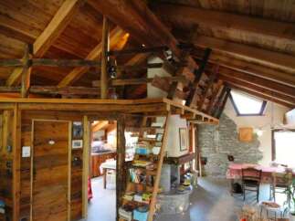 Experience rustic charm in this stunning wooden home.