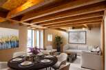 Discover the charm of this stunning property, featuring a beautifully designed interior with exposed wooden beams that add warmth and character.