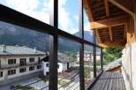 Enjoy breathtaking mountain views from this charming balcony.
