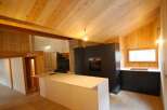 This stunning kitchen boasts a modern design with a warm, inviting atmosphere.