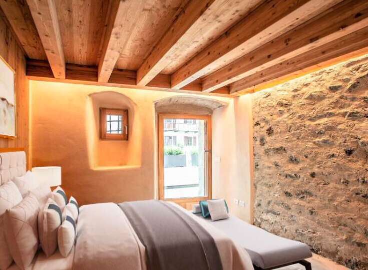 Experience rustic charm in this beautifully designed bedroom.