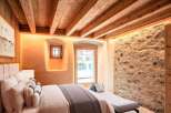Experience rustic charm in this beautifully designed bedroom.