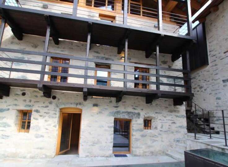 Discover the charm of this stunning stone-built property, featuring a unique balcony design.