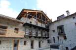 Discover the charm of this unique property featuring stunning stone architecture and inviting balconies.