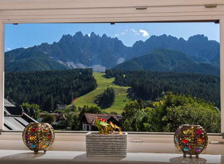 Enjoy breathtaking mountain views from this stunning property.