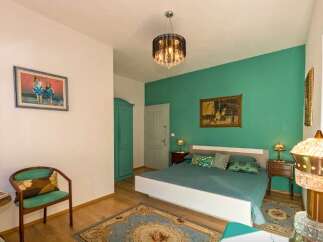 Discover a charming bedroom with a touch of elegance.