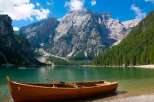 Explore the breathtaking beauty of this stunning lake surrounded by majestic mountains.