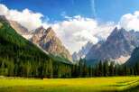 Explore the breathtaking beauty of the mountains, where nature's grandeur unfolds.