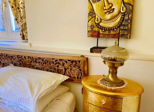Experience tranquility in this beautifully decorated bedroom.