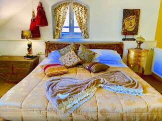 Experience tranquility in this beautifully decorated bedroom.