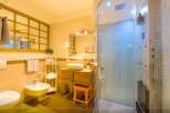 This beautiful bathroom features a modern design with a touch of elegance.