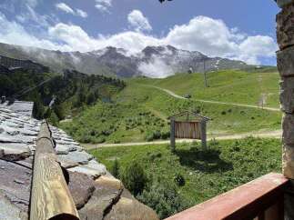 Enjoy breathtaking mountain views from this charming property.