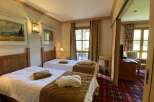 Cozy bedroom with two twin beds, perfect for a comfortable stay.