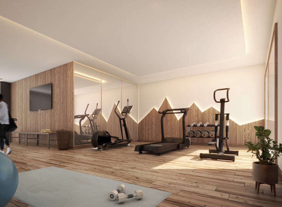 Step into your dream home gym! This space boasts modern equipment, stylish wood accents, and ample natural light.