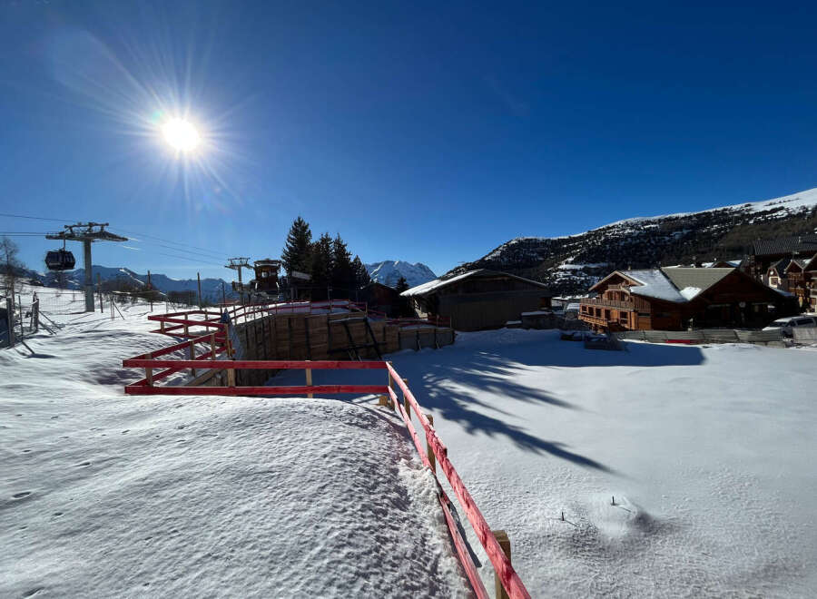 Enjoy a winter wonderland at this stunning property! Nestled in a snowy landscape, this home offers breathtaking mountain views and a cozy atmosphere.
