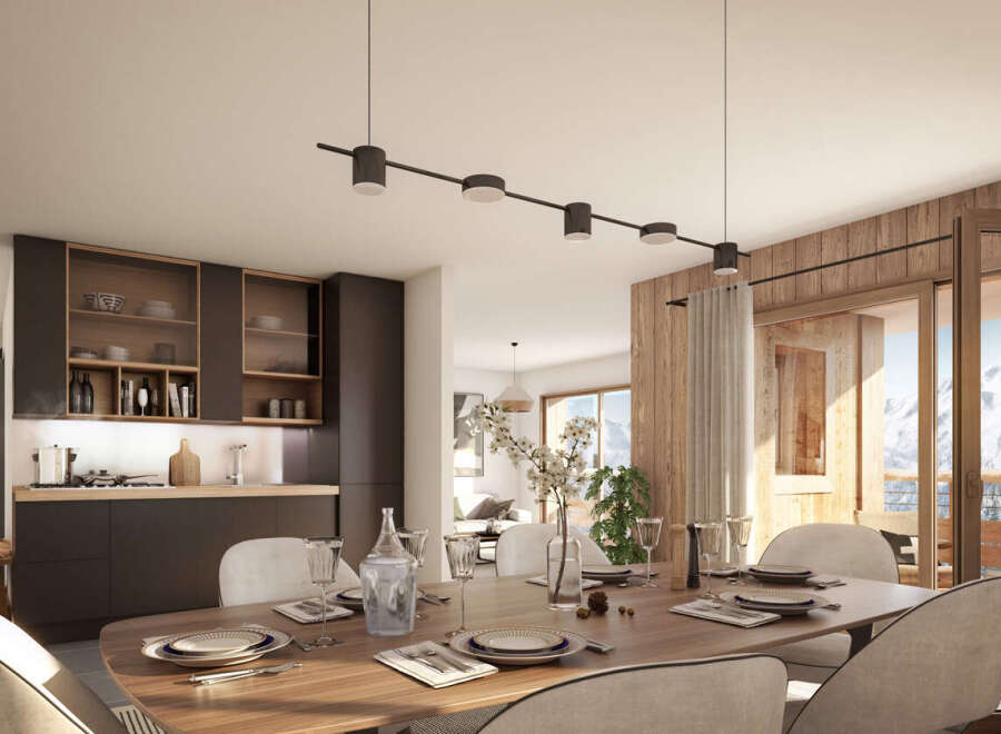 Experience luxury living in this stunning property, featuring a modern kitchen and elegant dining area.