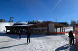 Enjoy a day of skiing at the Alpe Express! This charming ski lodge offers a cozy atmosphere and stunning views of the snowy landscape.