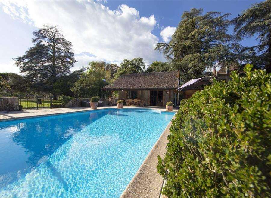 Luxury villa with private pool and stunning garden views.