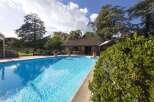 Luxury villa with private pool and stunning garden views.