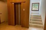 Discover a home with timeless elegance, featuring a classic elevator for easy access to all levels.