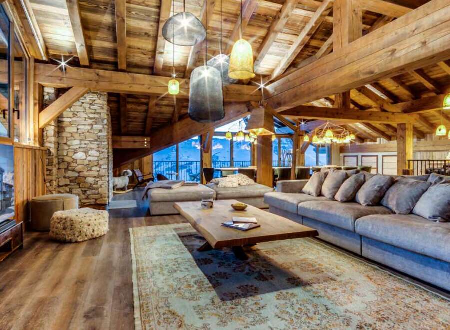 Luxury chalet with stunning mountain views and spacious open-plan living area.