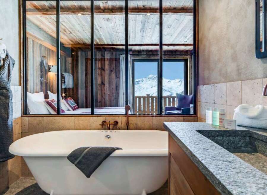 Luxury chalet bathroom with stunning mountain views.