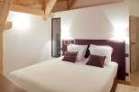 Discover luxury living in this stunning bedroom.